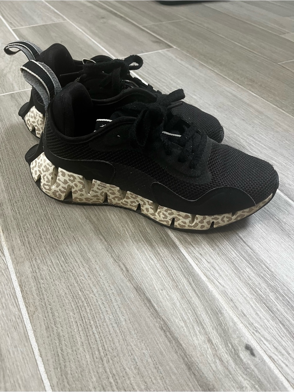 Reebok Black Athletic Sneakers with Cream Leopard-Pattern Sole